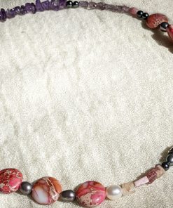 Rhodochrosite Crystal necklace flat, spiritual and healing properties. rhodochrosite benefits for love